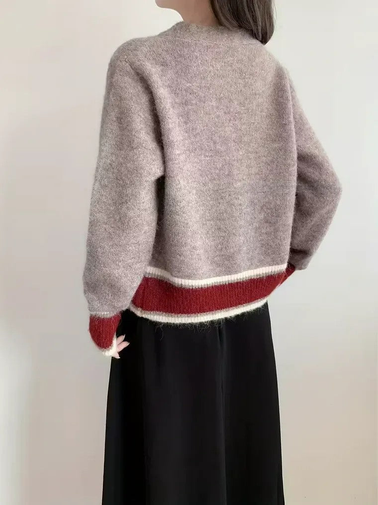 Cardigan à manches longues pour femmes avec décolleté en V et patte de boutonnage à trois boutons en surface chinée