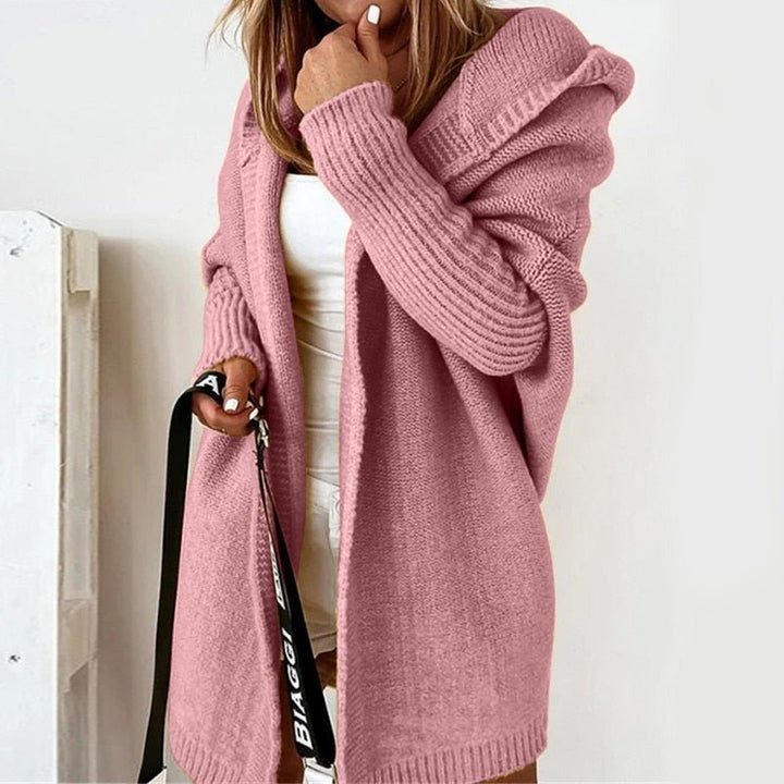 Veste en tricot longue pour femmes avec capuche, devant ouvert et poignets structurés