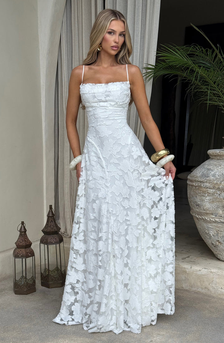 Robe maxi femme avec décolleté en cascade, bretelles spaghetti, motif floral et lacets au dos