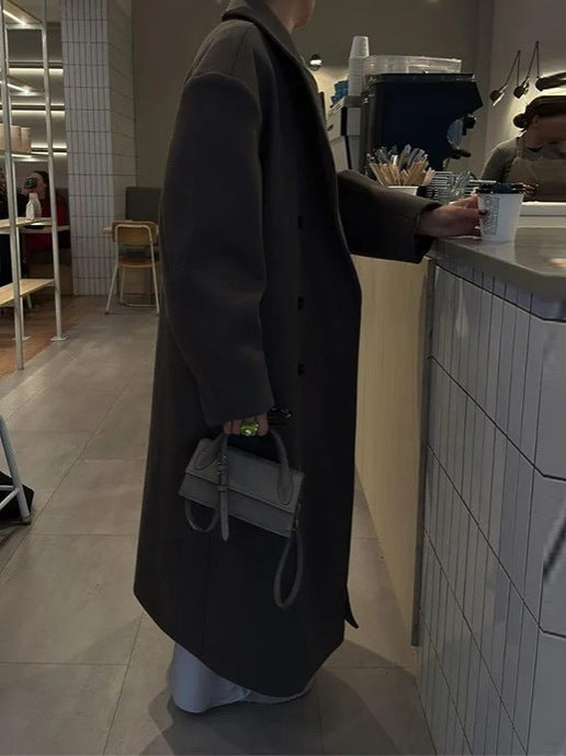 Manteau pour femmes avec col revers et fermeture à double boutonnage