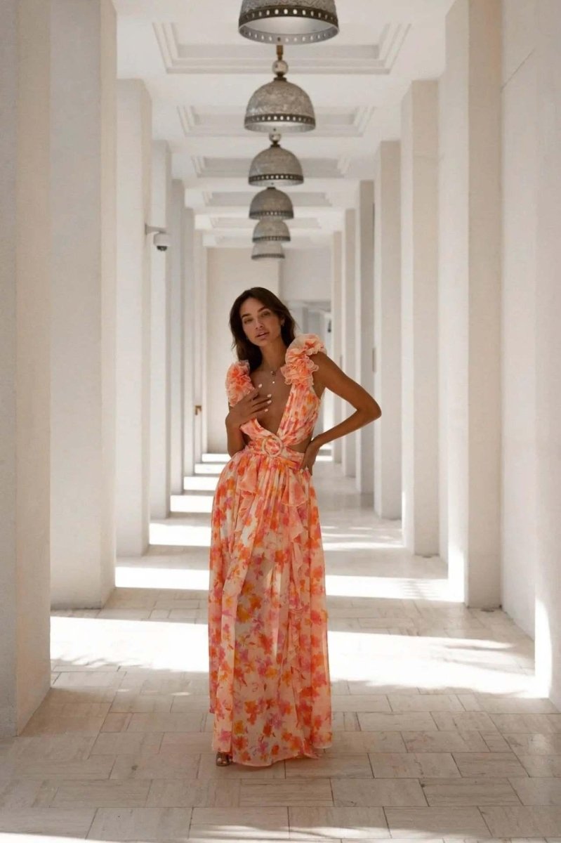 Robe maxi femme avec décolleté en V profond et manches à volants avec découpes latérales et motif floral