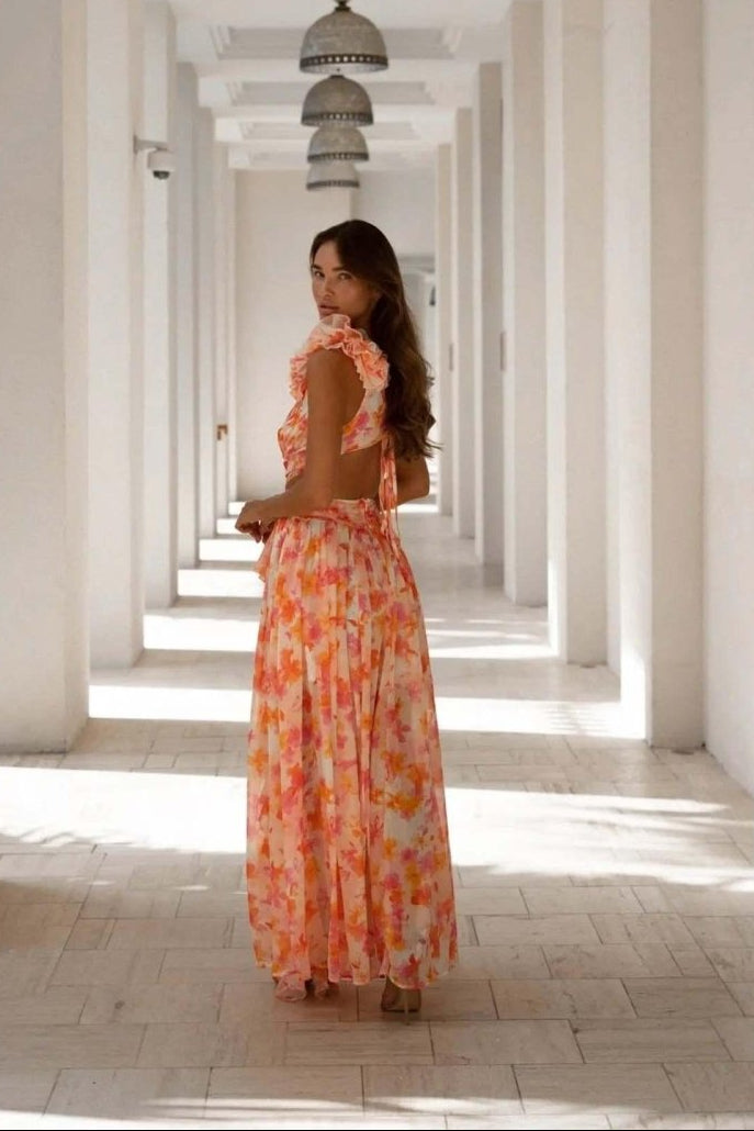 Robe maxi femme avec décolleté en V profond et manches à volants avec découpes latérales et motif floral