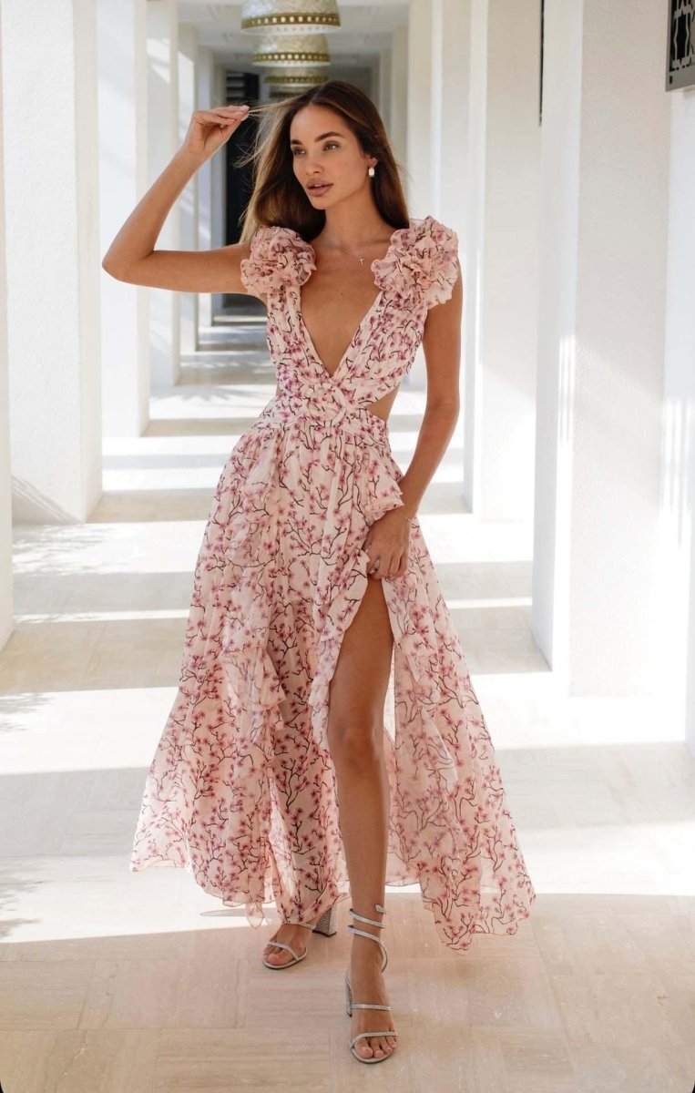 Robe maxi femme avec décolleté en V profond et manches à volants avec découpes latérales et motif floral