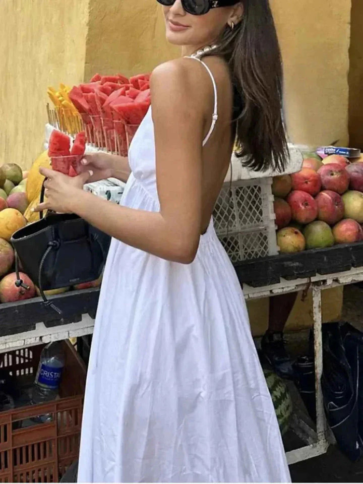 Robe maxi pour femmes avec décolleté en V profond et bretelles spaghetti, dos ouvert et jupe ample