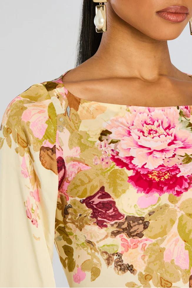 Robe maxi pour femmes avec décolleté bateau, manches longues, poignets en trompette et motif floral