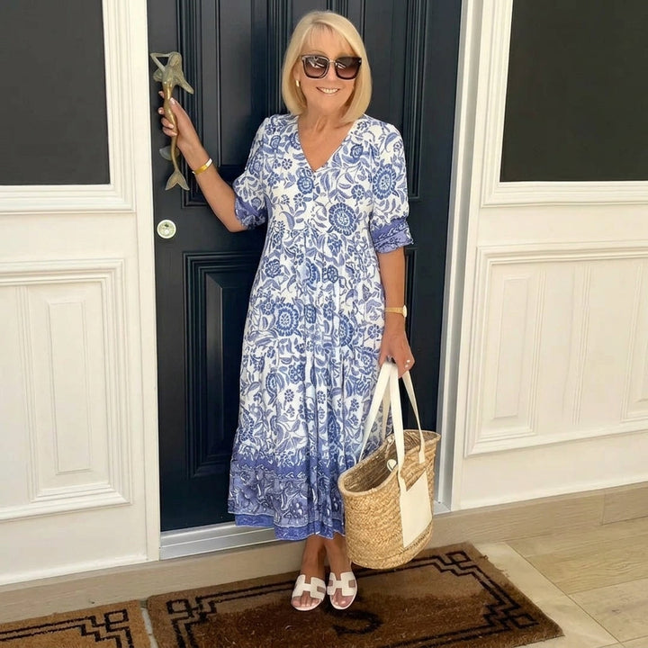 Robe maxi femme avec décolleté en V, patte de boutonnage et motif floral