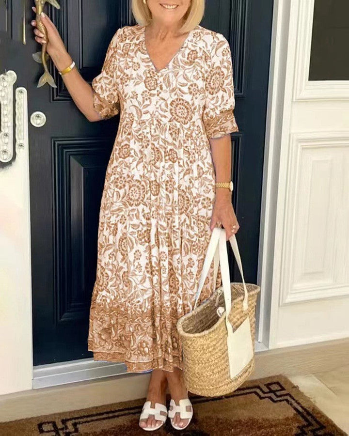 Robe maxi femme avec décolleté en V, patte de boutonnage et motif floral