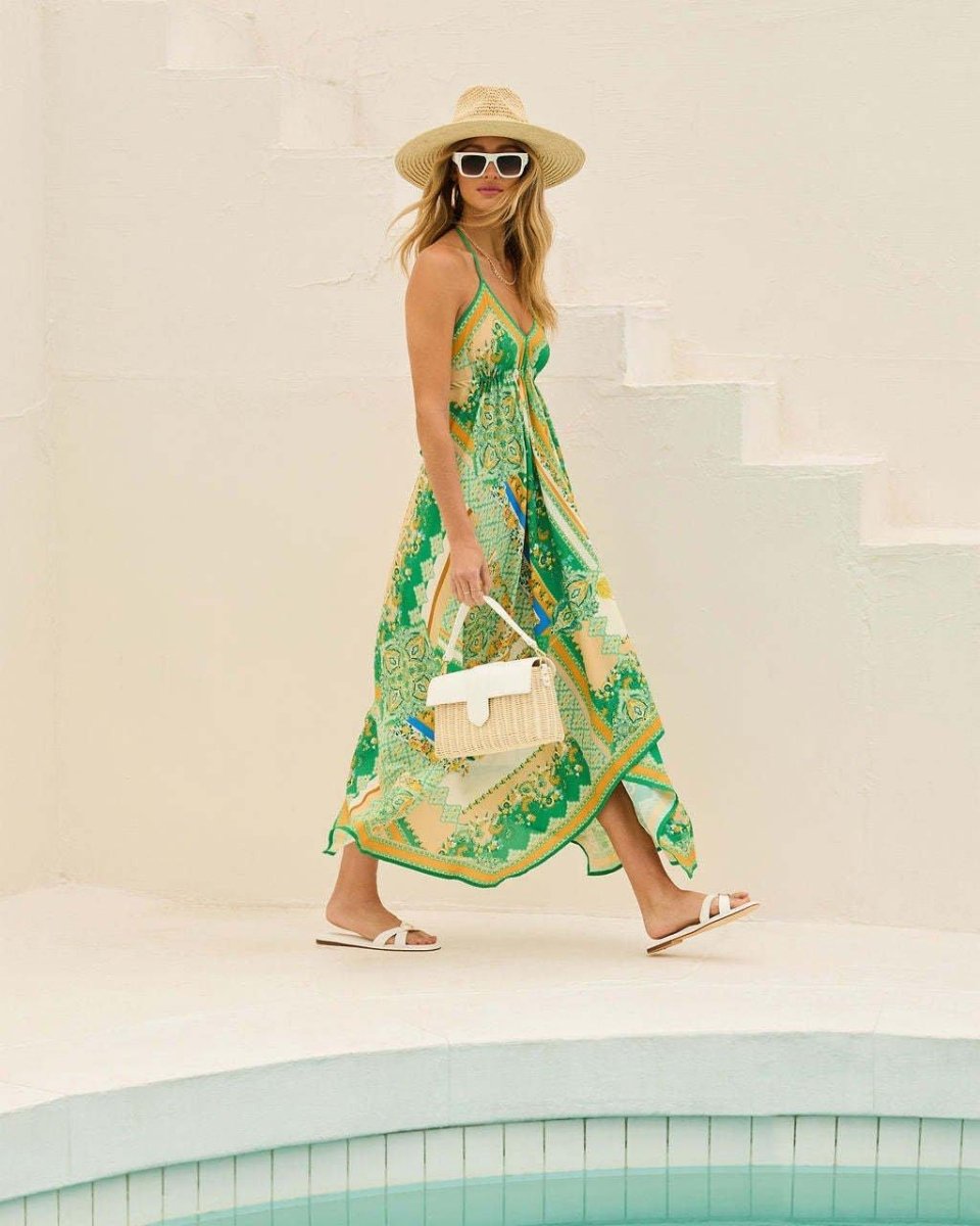 Robe maxi femme avec décolleté en V et bretelles spaghetti, dos nu et ourlet asymétrique