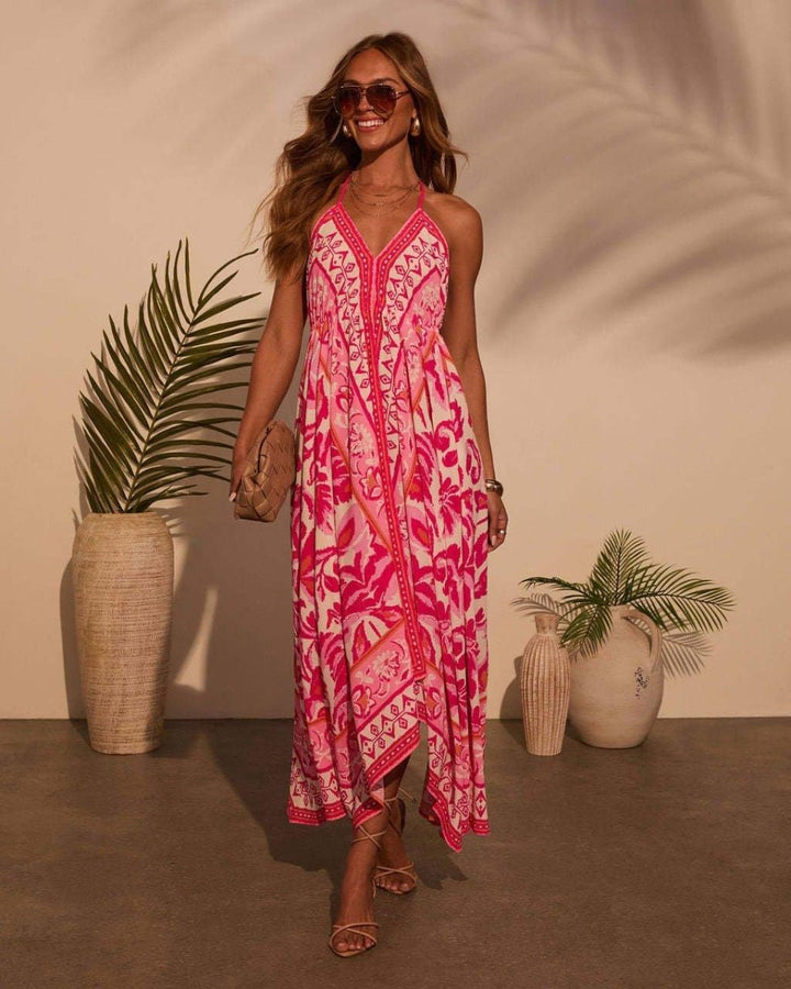 Robe maxi femme avec décolleté en V et bretelles spaghetti, dos nu et ourlet asymétrique