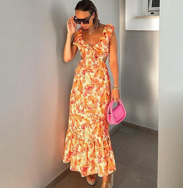 Robe maxi femme avec décolleté en V et bretelles volantées avec découpes latérales et motif floral