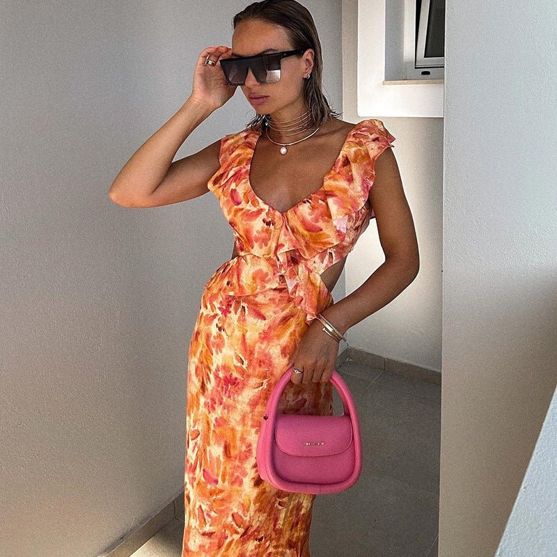 Robe maxi femme avec décolleté en V et bretelles volantées avec découpes latérales et motif floral