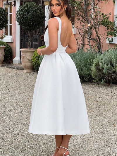 Robe midi femme avec décolleté bateau, taille en V et jupe plissée ample