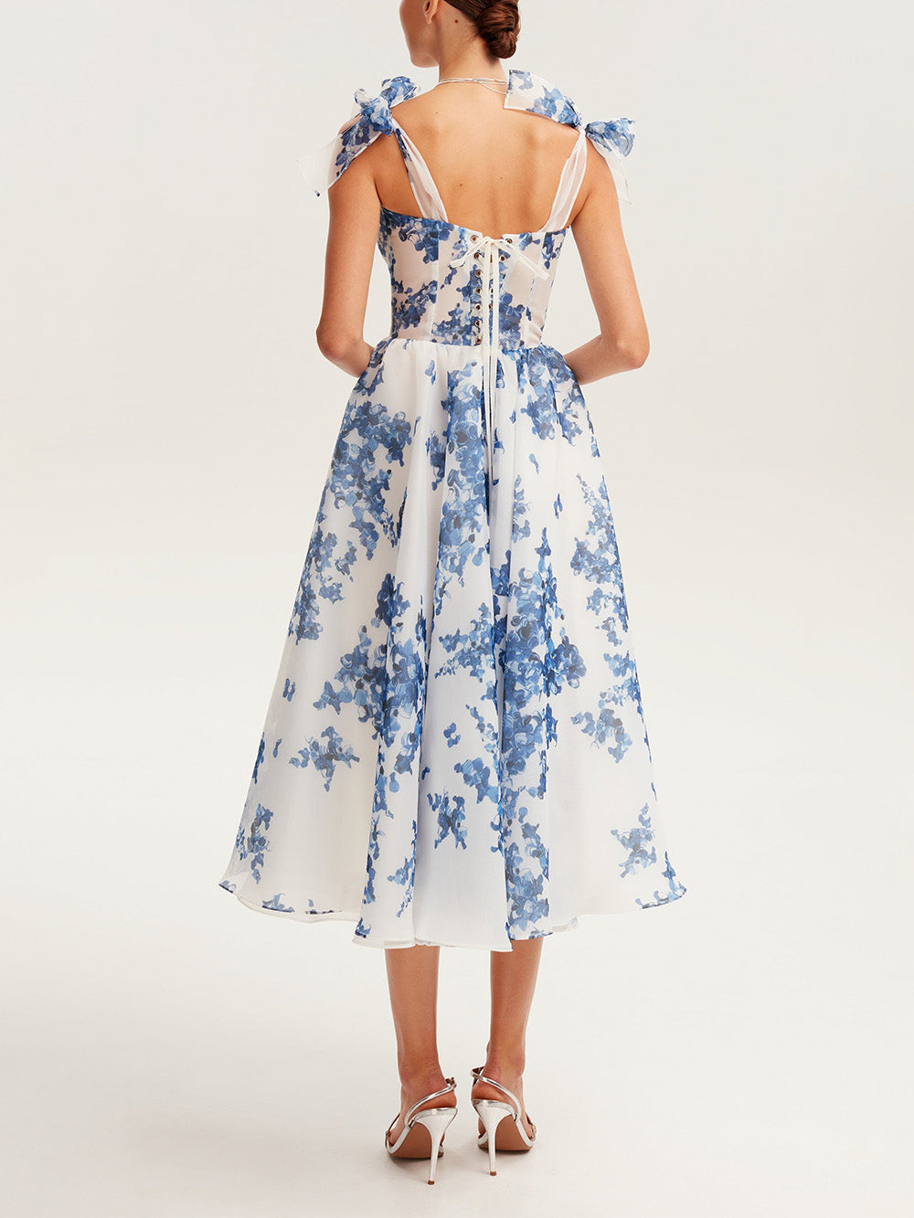 Robe midi femme avec décolleté en cœur et bretelles à nouer avec nœuds et motif floral