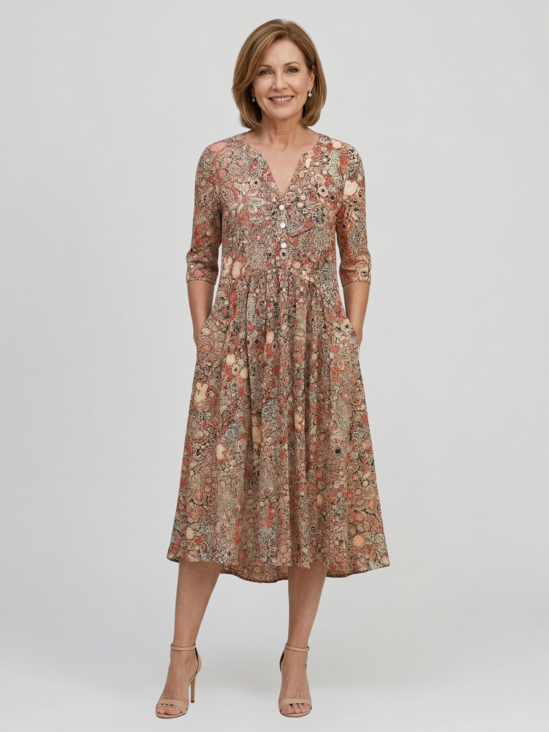 Robe midi femme avec décolleté en V, manches trois-quarts et motif floral