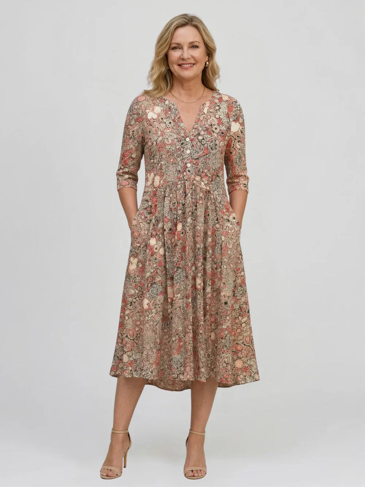 Robe midi femme avec décolleté en V, manches trois-quarts et motif floral