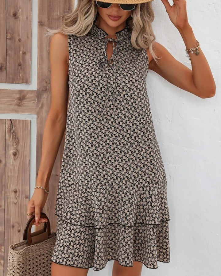 Robe midi sans manches pour femmes avec ourlet en couches et lien de fermeture