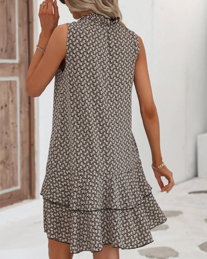 Robe midi sans manches pour femmes avec ourlet en couches et lien de fermeture