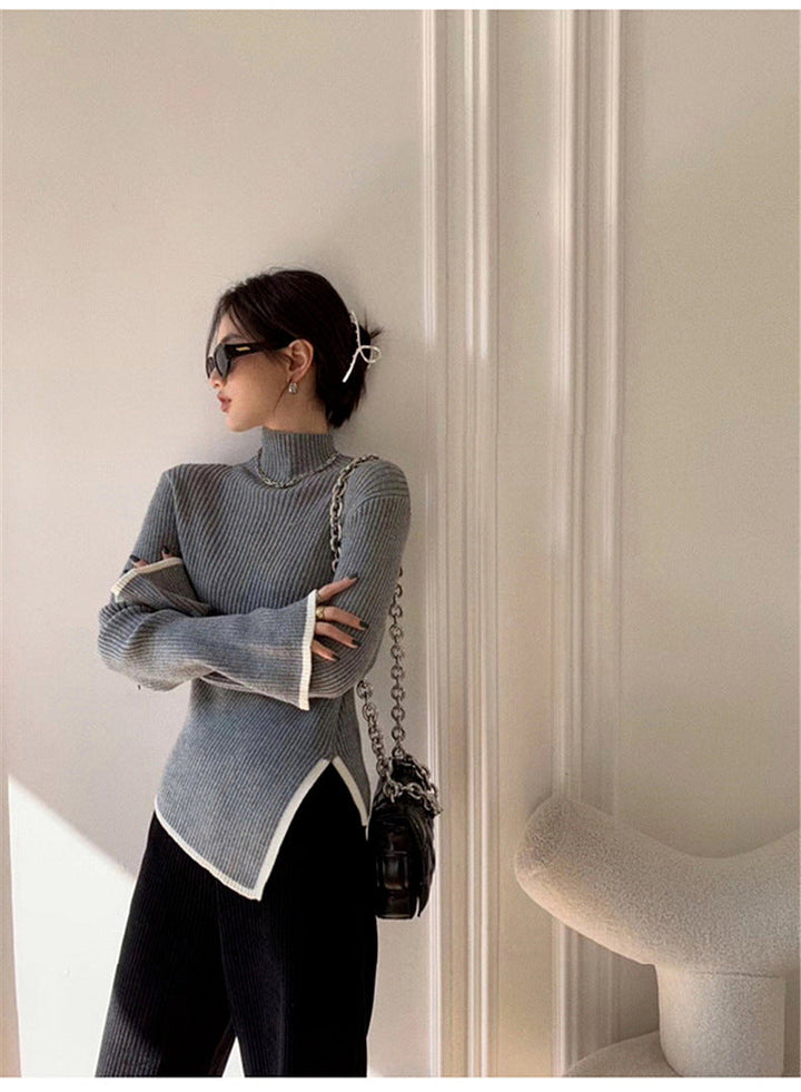 Pull femme avec col roulé, manches longues, passepoil contrasté et fente sur le côté