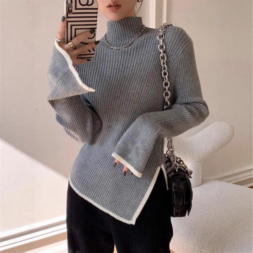 Pull femme avec col roulé, manches longues, passepoil contrasté et fente sur le côté