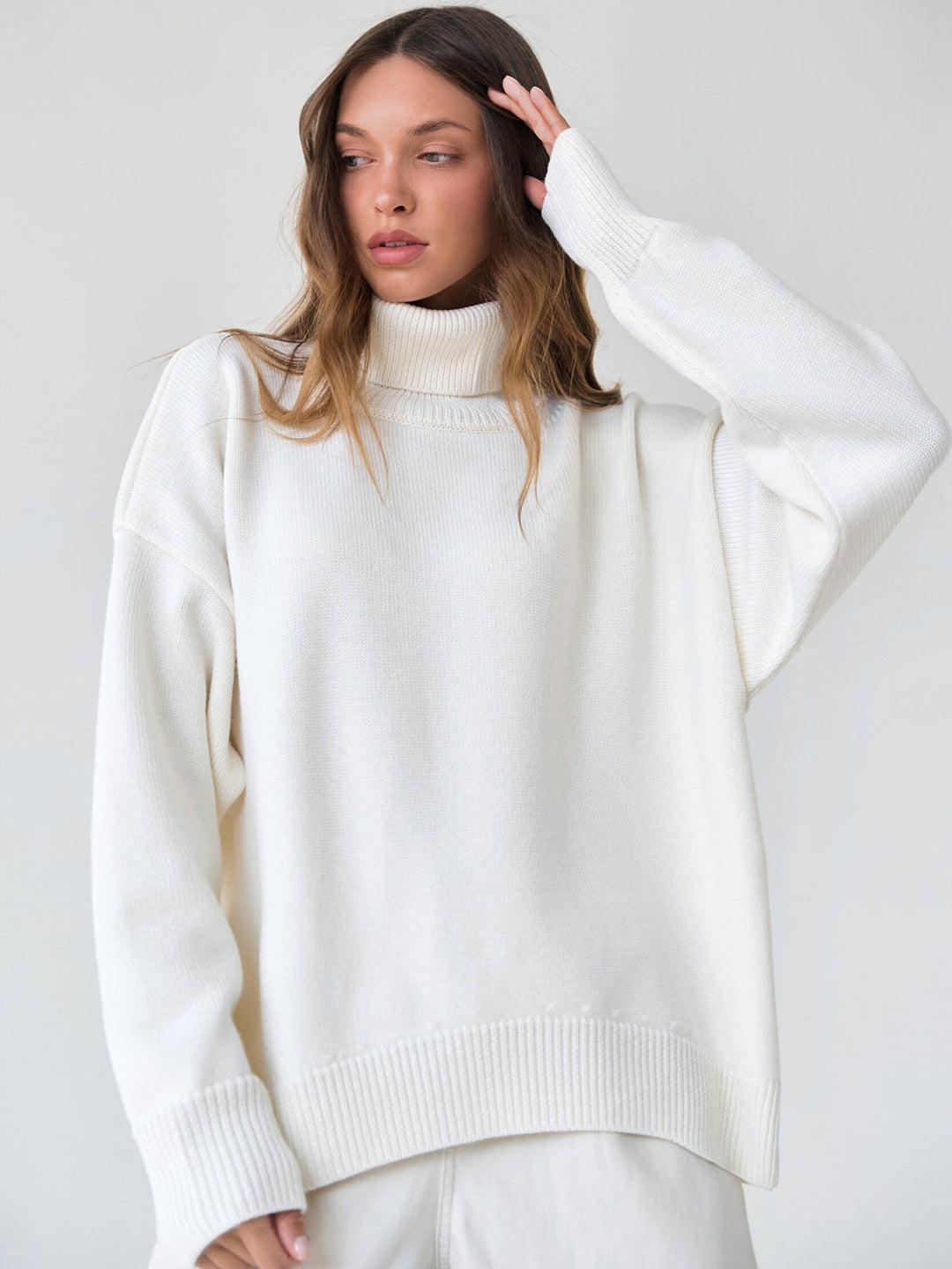 Pull à col roulé pour femmes avec col haut et poignets élastiques