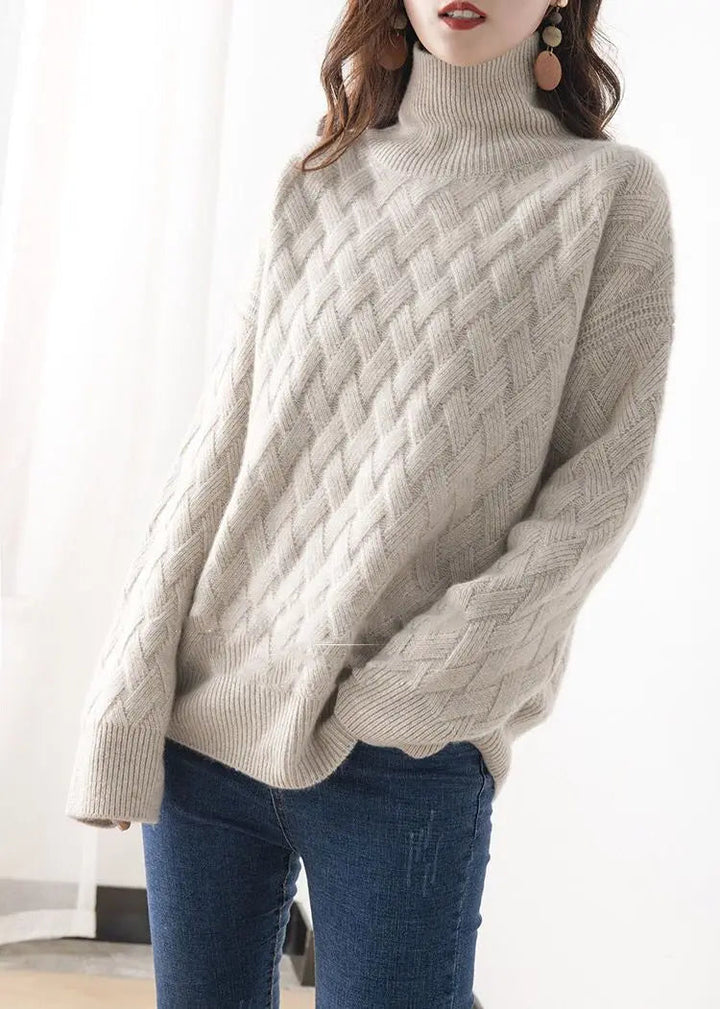 Pull à col roulé pour femmes avec motif en relief et manches longues