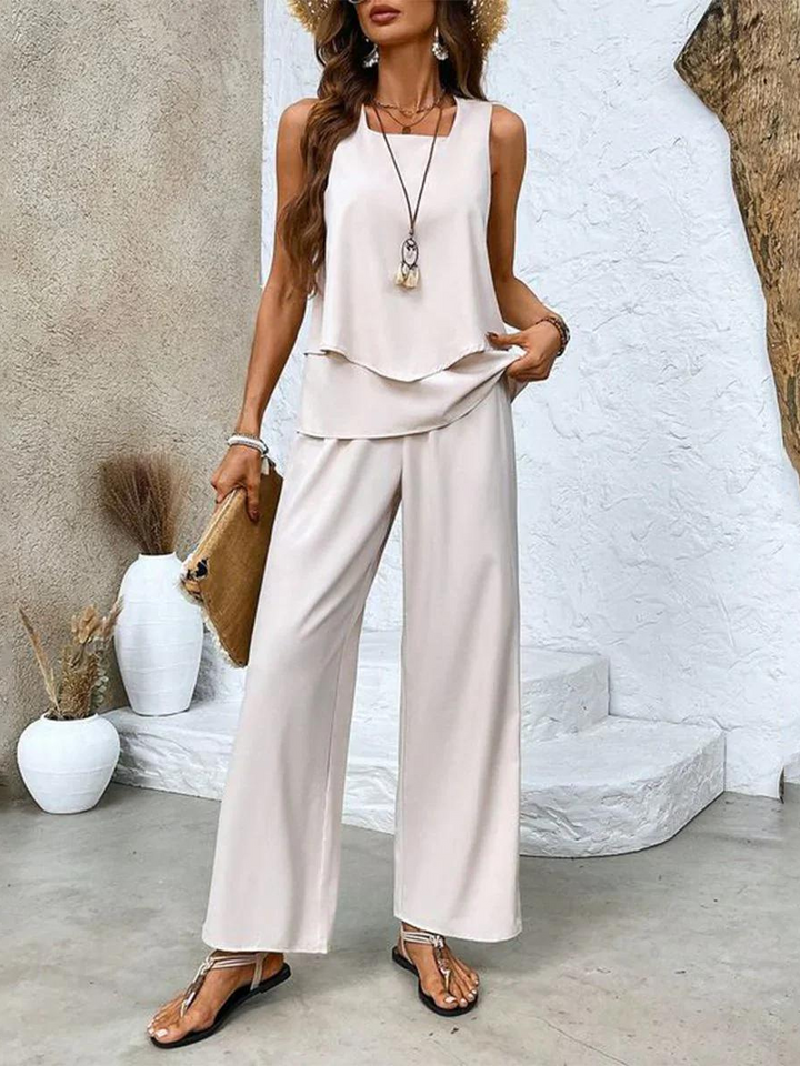 Ensemble pour femmes avec haut sans manches, décolleté droit, ourlet en couches et pantalon large