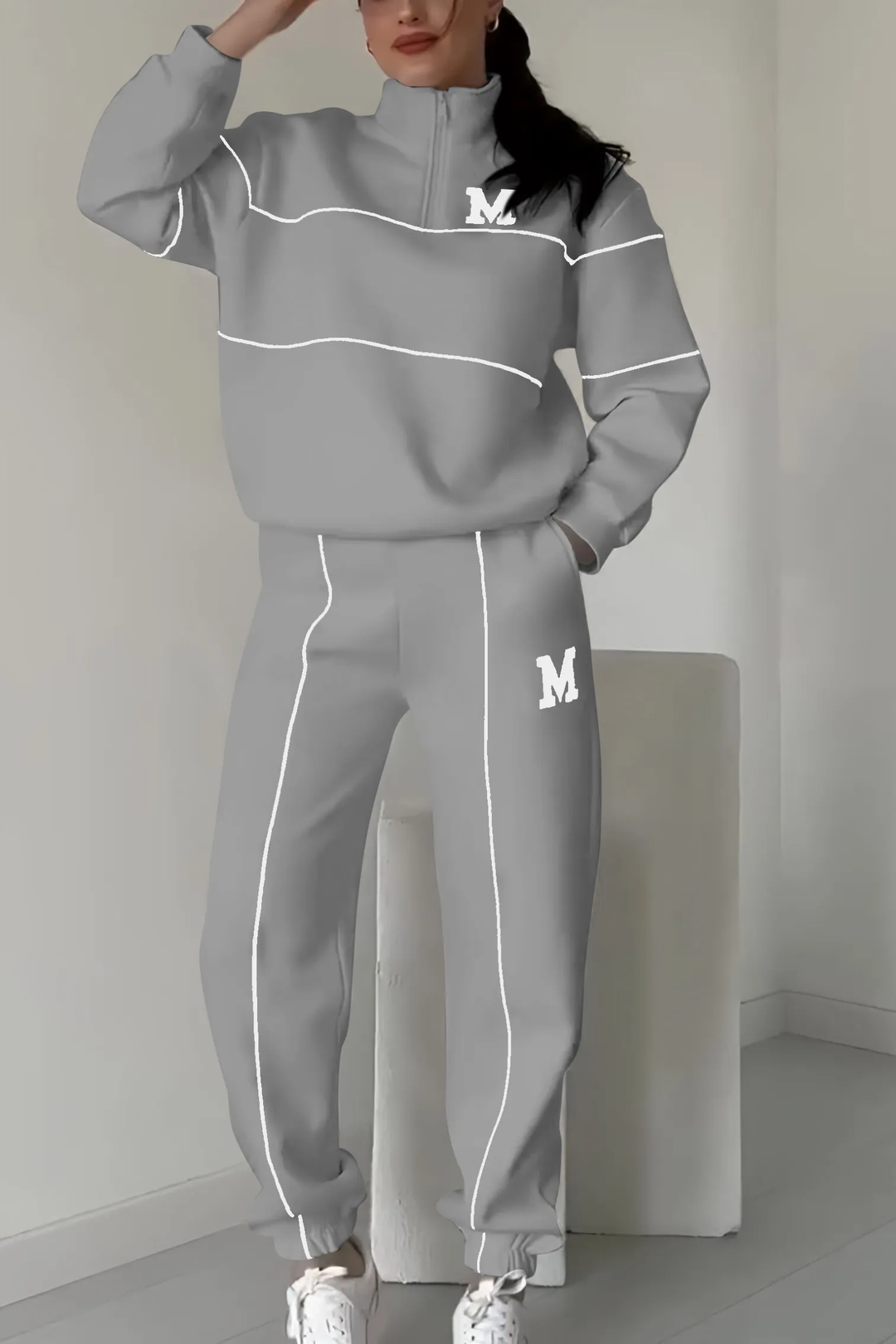 Ensemble pour femmes avec pull à demi-zip et pantalon de jogging avec bandes contrastées
