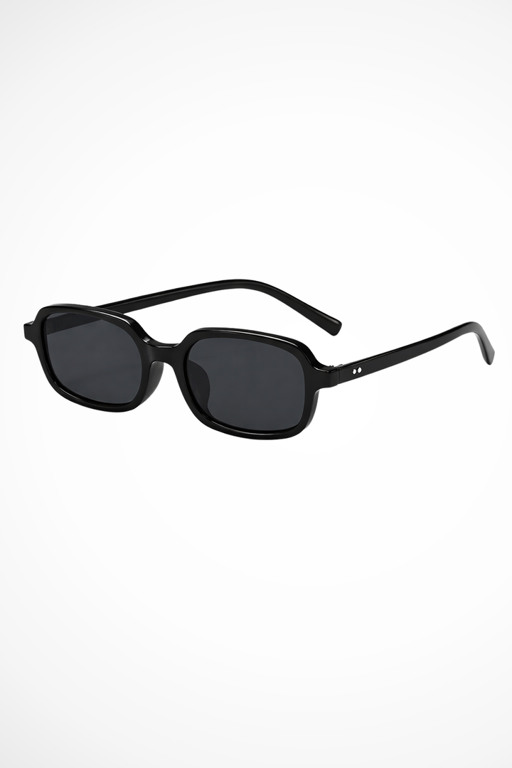 Lunettes de soleil pour femmes avec monture rectangulaire et coins biseautés