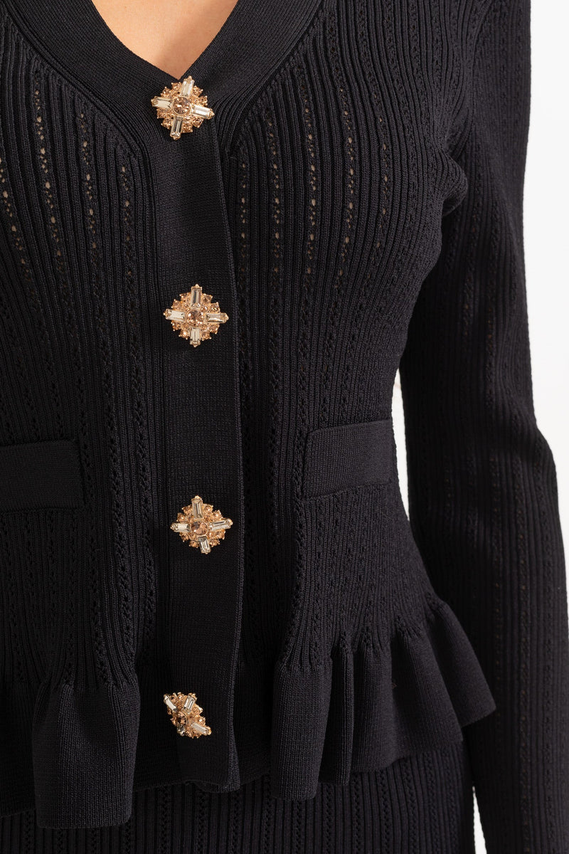 Ensemble tricot pour femmes avec décolleté en V, bas peplum et manches longues