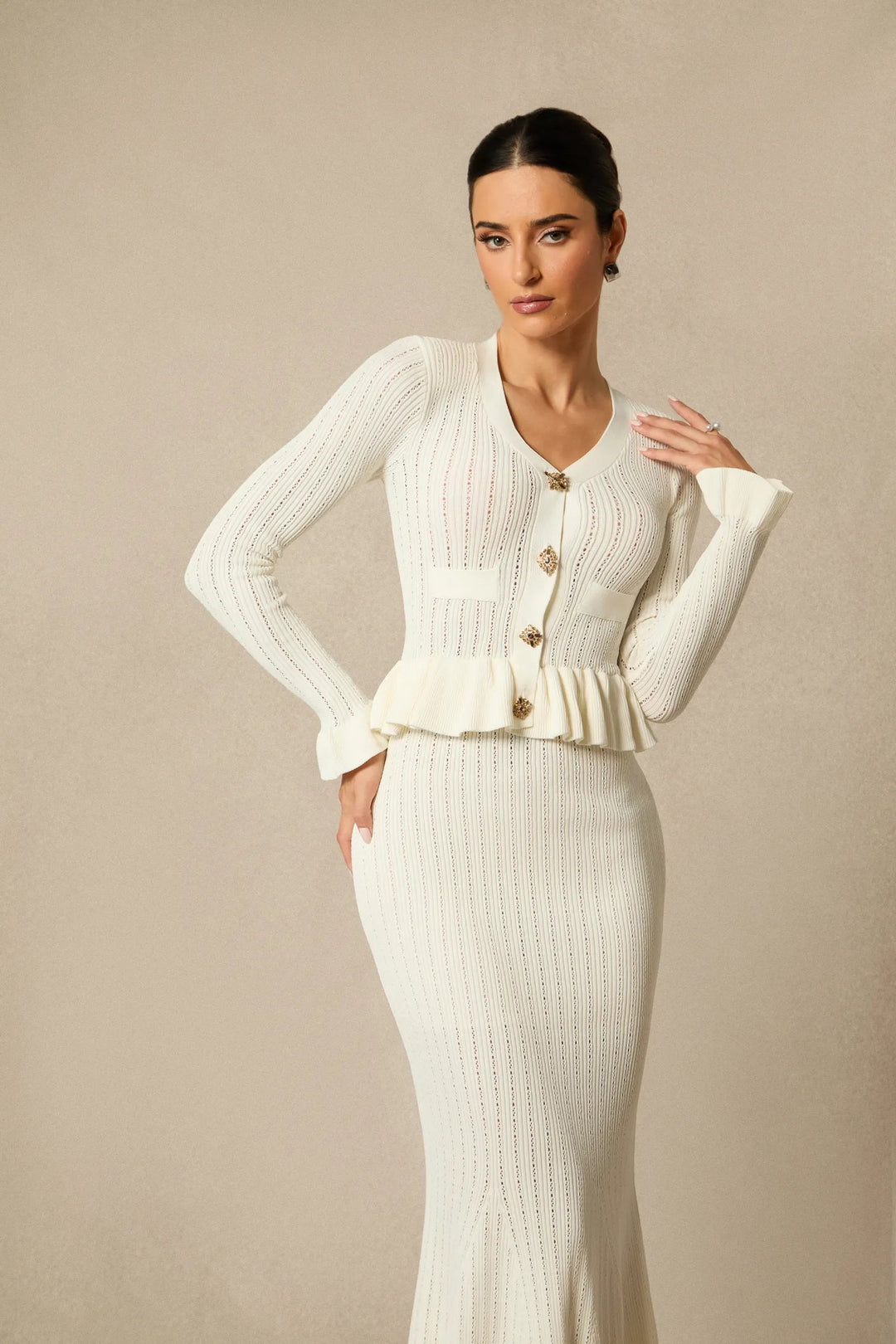 Ensemble tricot pour femmes avec décolleté en V, bas peplum et manches longues