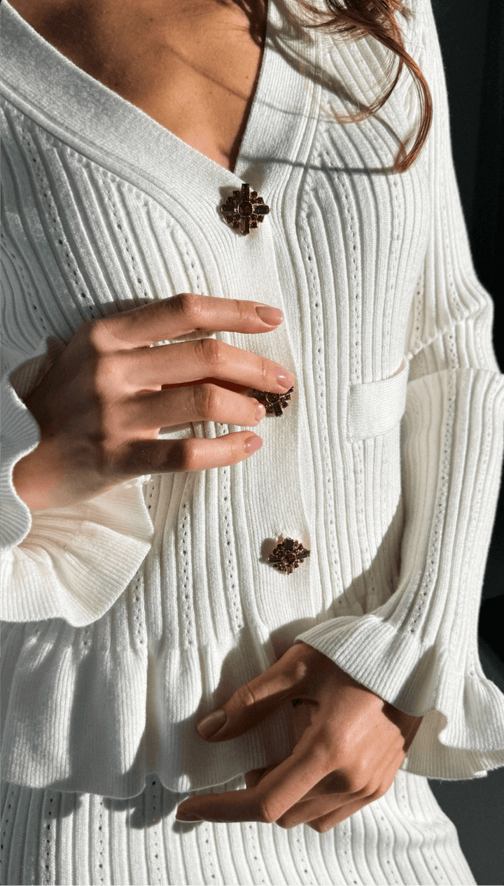 Ensemble tricot pour femmes avec décolleté en V, bas peplum et manches longues