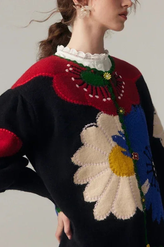 Gilet pour femmes avec boutonnière et motif floral en relief ainsi que bord en arc