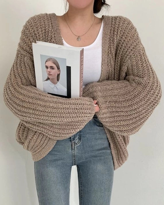 Gilet pour femmes à ouverture frontale, manches longues et surface en grosse maille