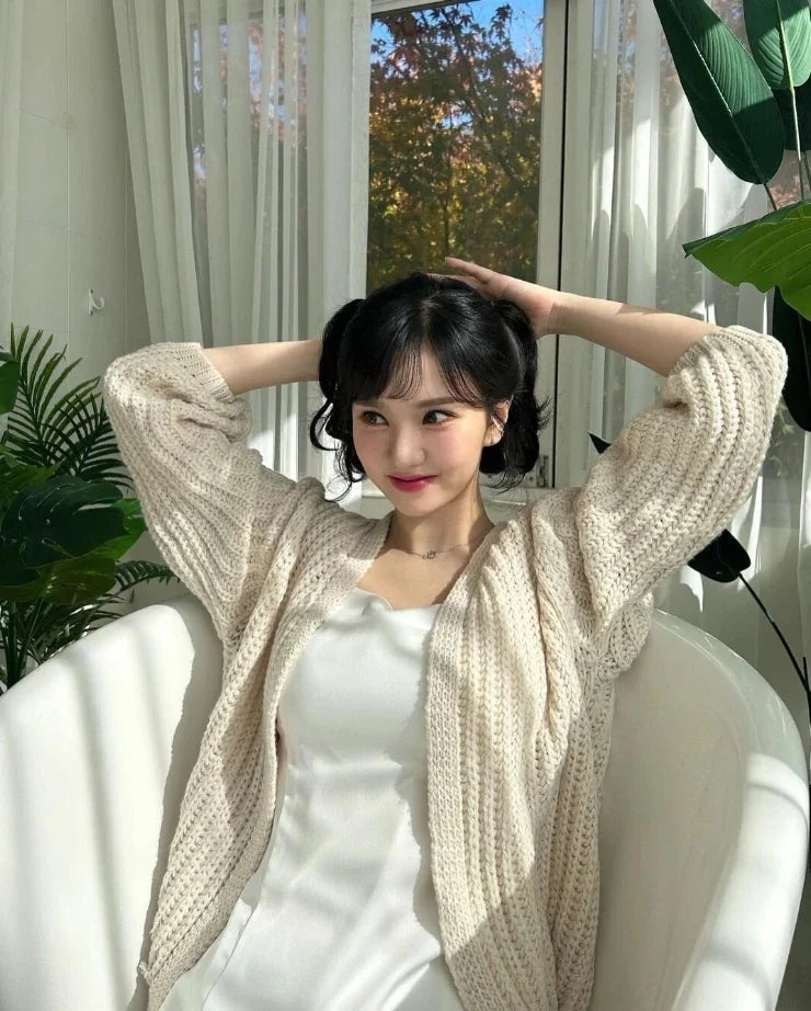 Cardigan pour femmes avec devant ouvert, manches longues et surface en grosse maille