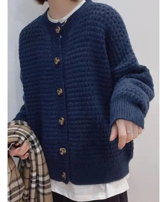 Veste en tricot pour femmes avec col rond, fermeture à boutons, manches ballon et motif structuré