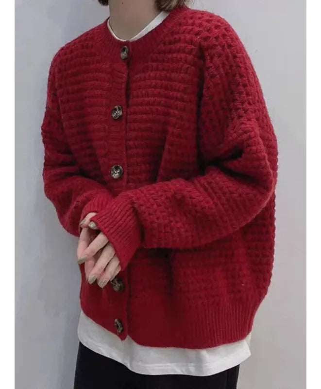 Veste en tricot pour femmes avec col rond, fermeture à boutons, manches ballon et motif structuré