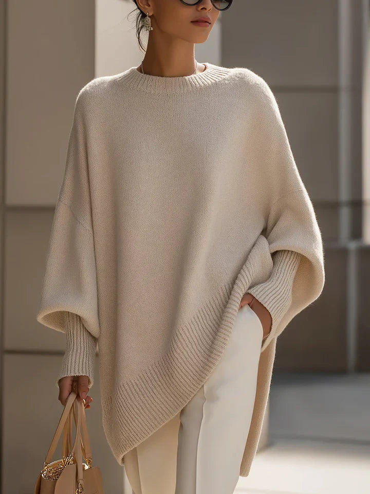Pull en tricot pour femmes avec col rond et manches chauve-souris ainsi qu'un ourlet en côtes