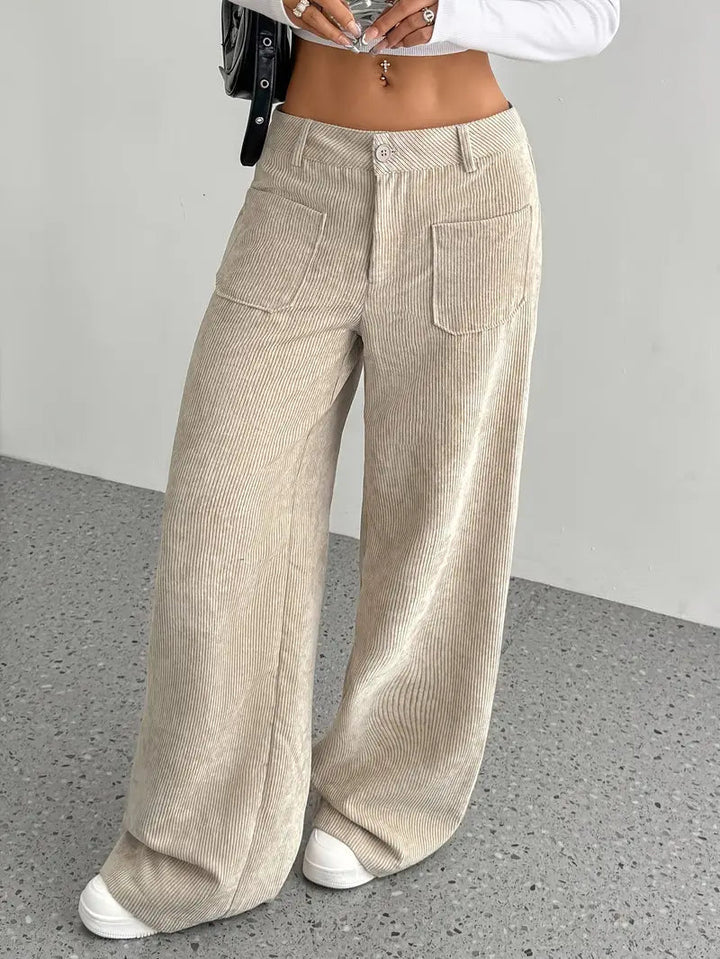 Pantalon large pour femmes avec taille haute, fermeture à bouton et poches plaquées