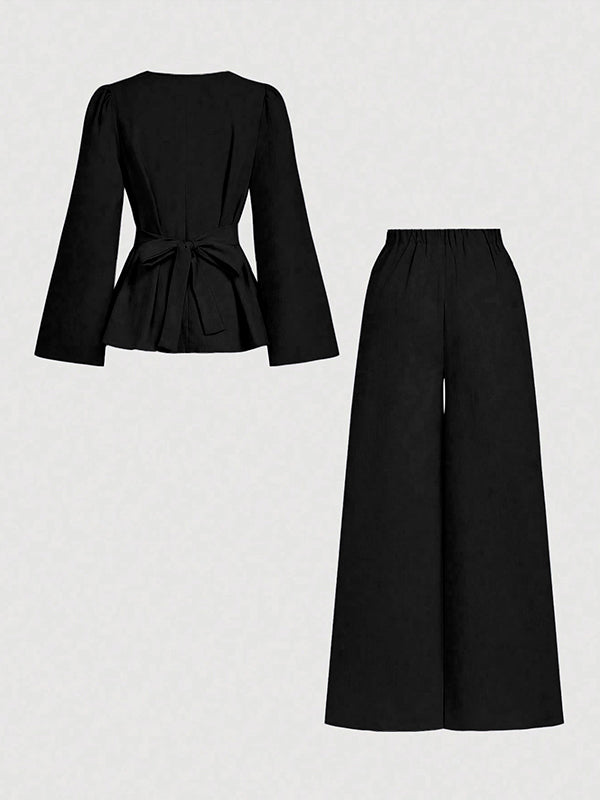 Pantalon ample taille haute, à empiècements, couleur unie