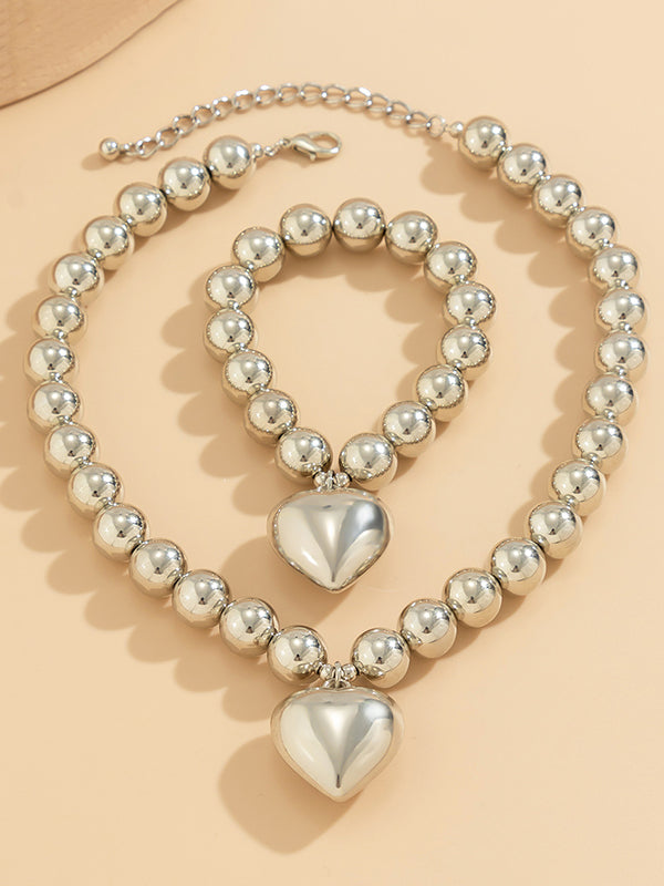 Parure bracelet et collier perlée brillante délicate en forme de cœur