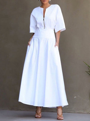 Robe longue ample à manches mi-longues, à fermeture éclair, à col rond, couleur unie