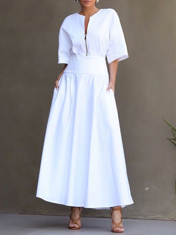 Robe longue ample à manches mi-longues, à fermeture éclair, à col rond, couleur unie