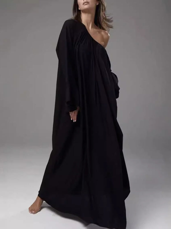 Robe longue ample plissée à manches évasées, à empiècements, à col rond, couleur unie