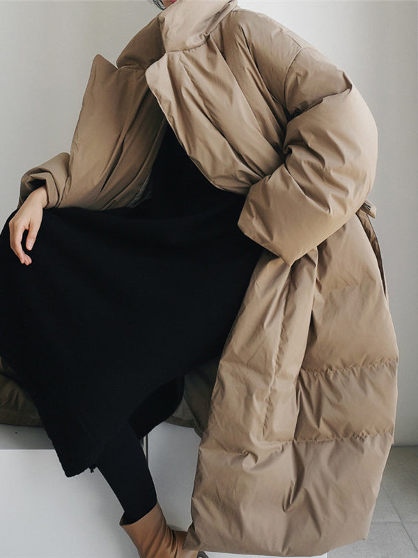 Manteau ample noué matelassé à manches longues, à col haut, couleur unie