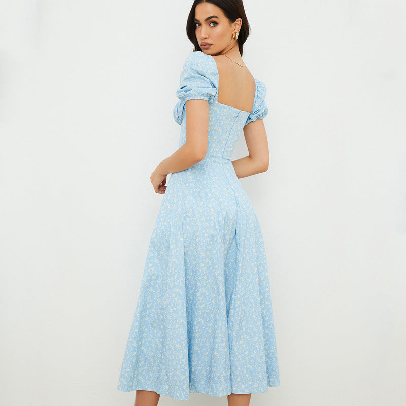 Lucia - Robe midi à fleurs avec manches bouffantes
