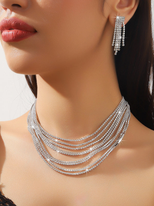 Parure boucles d'oreilles pendantes et collier superposée