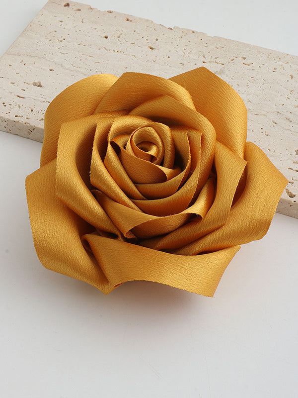 Broche en forme de fleur, couleur unie