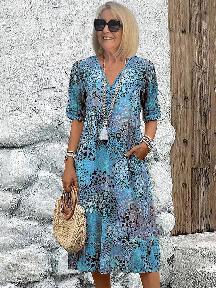 Lina | Robe midi vivante au style moderne