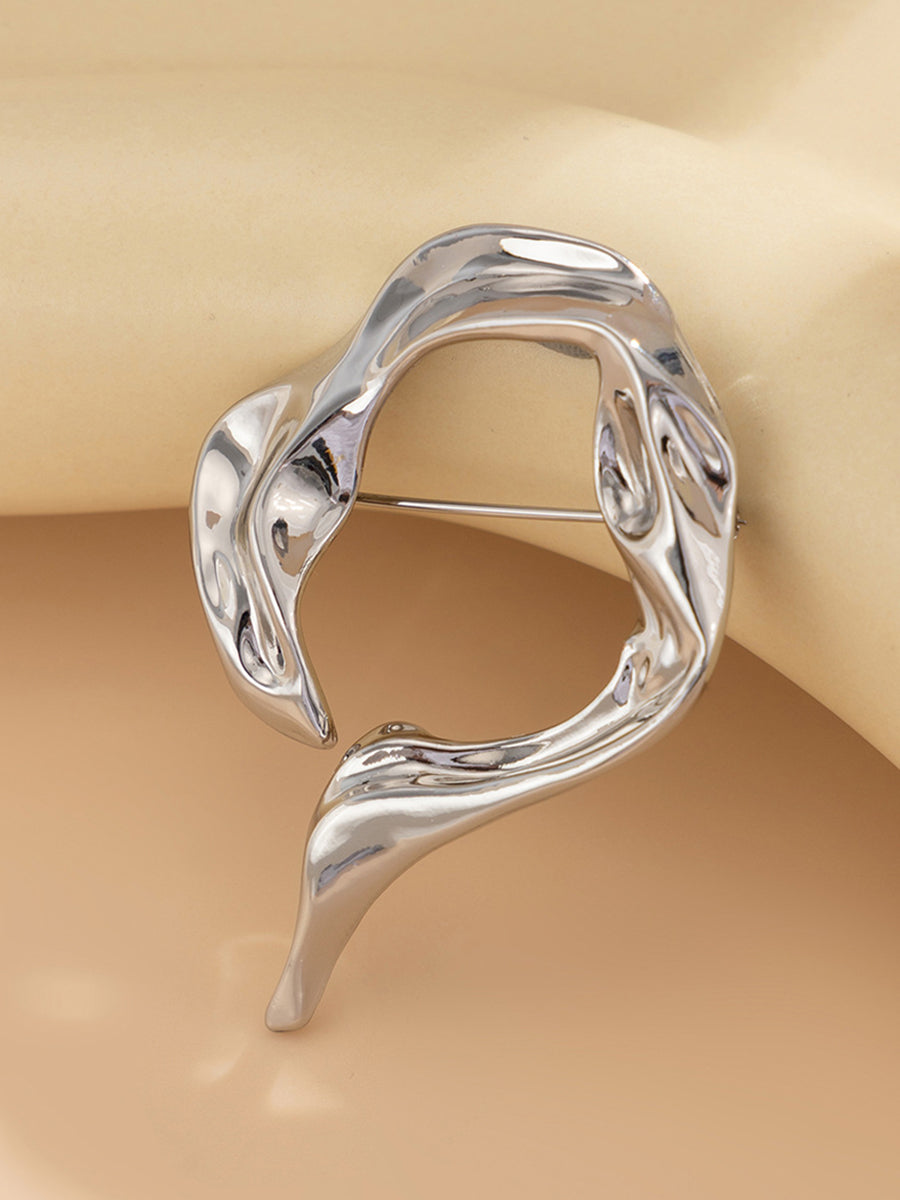 Broche à coupe irrégulière