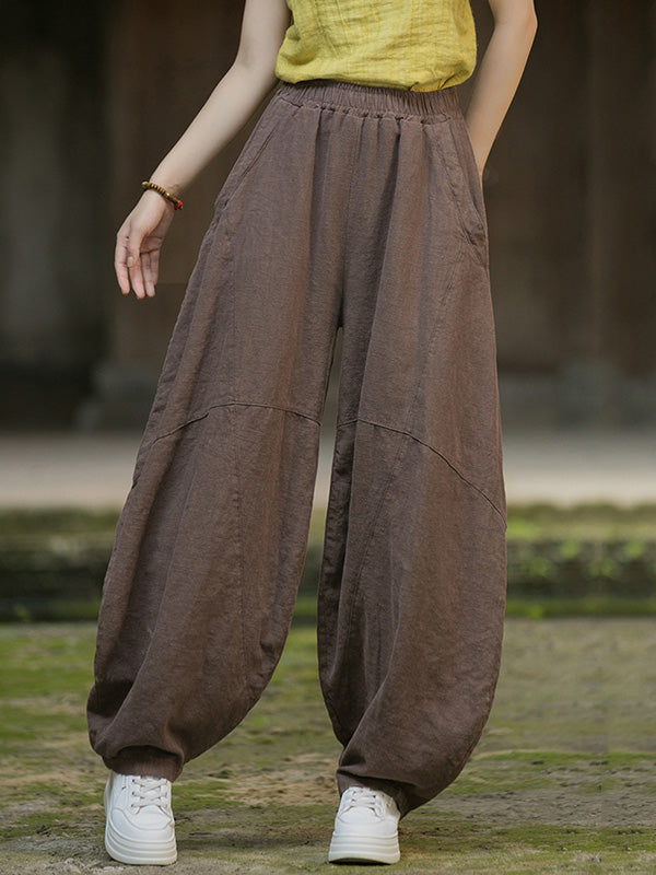 Pantalon ample à taille élastique, à poches, à empiècements, couleur unie